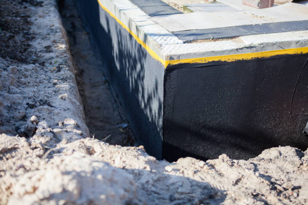 Professional Waterproofing technician working in Ferndale, MI